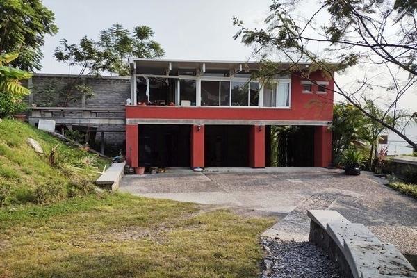 Foto de inmueble en Autopista Mexico-AcapulcoCto. Sta. Fe km. 22.562790 Mor.México, Col. Club de Golf Santa Fe C.P. 62790, Xochitepec